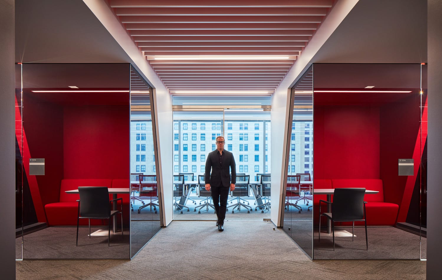 Man leaving main conference room at CNA Headquarters The meeting spaces can serve several purposes