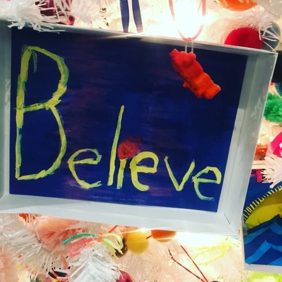 Believe Image St. Jude's patients painted decorations to adorn an IA holiday tree.