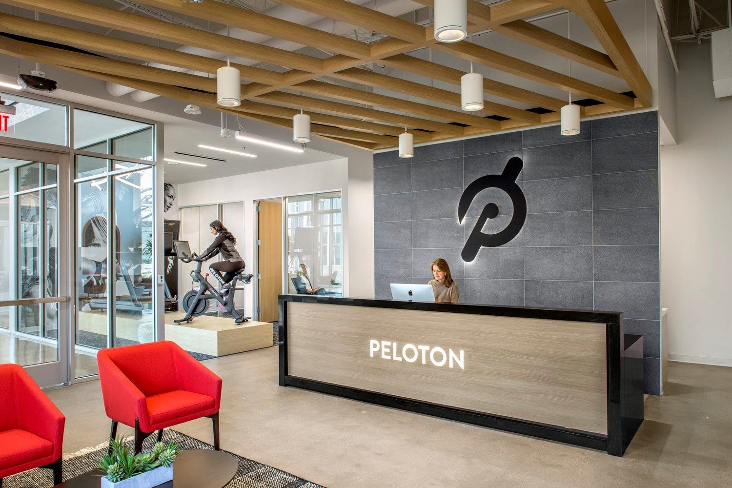 Peloton Reception Area 5 A warm wood lattice at by the Customer Care Center at the Peloton Customer Care Center.