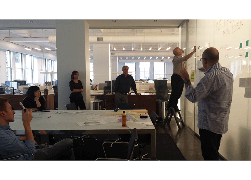 A design charrette in IA's New York office. Photo © IA Interior Architects.