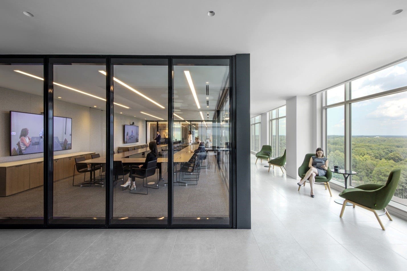 A collaborative meeting space with nearby informal work areas