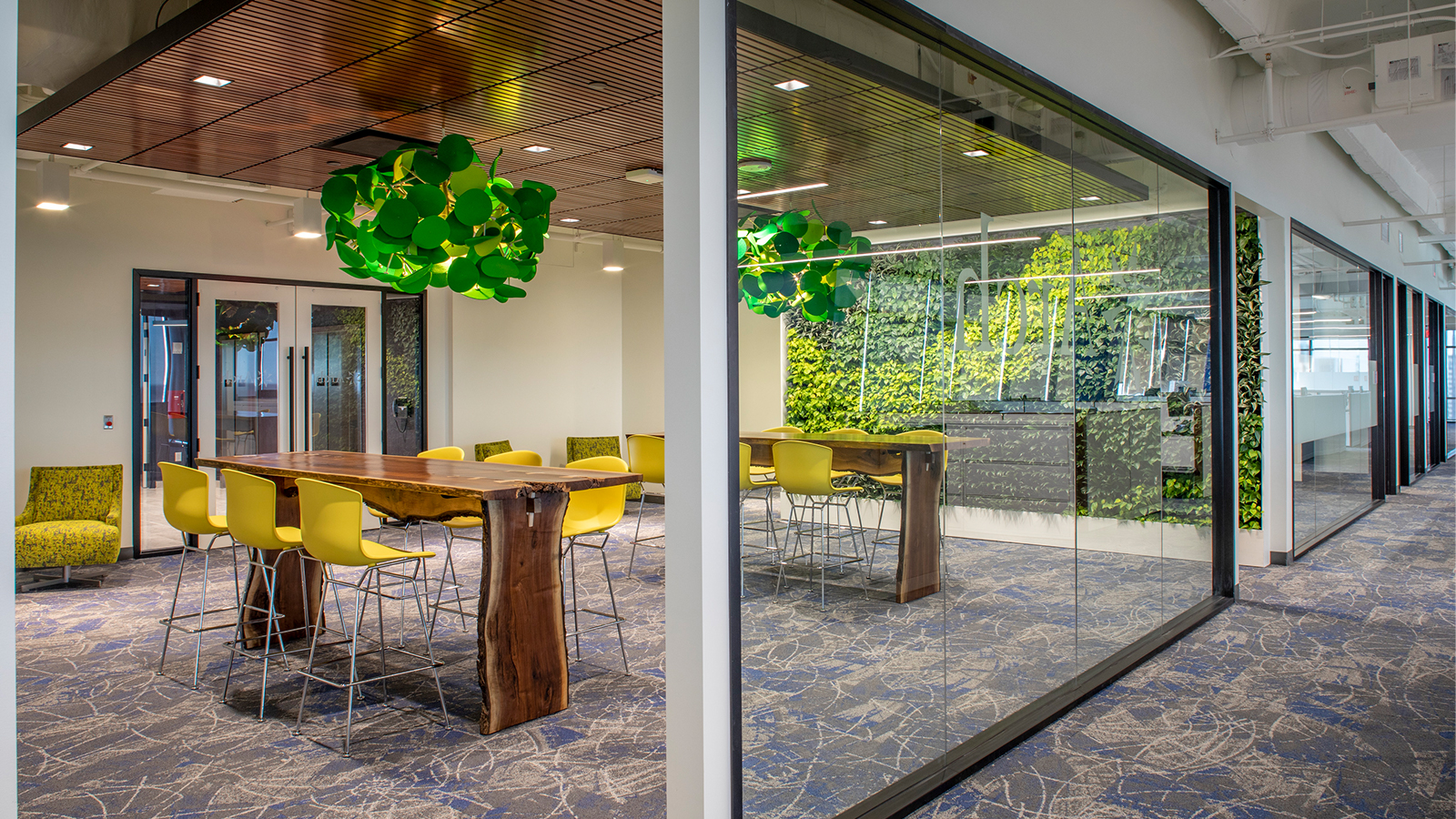 An enclosed work/meet space at Arch Insurance