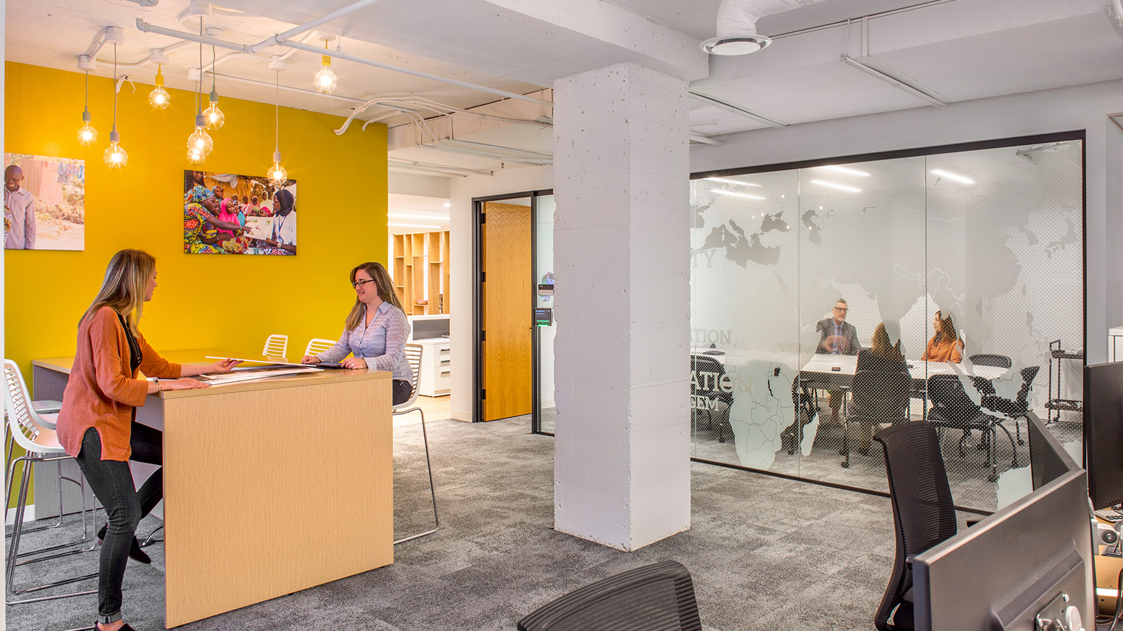 The graphic designs incorporated into this non-profits headquarters focus on the people they serve.