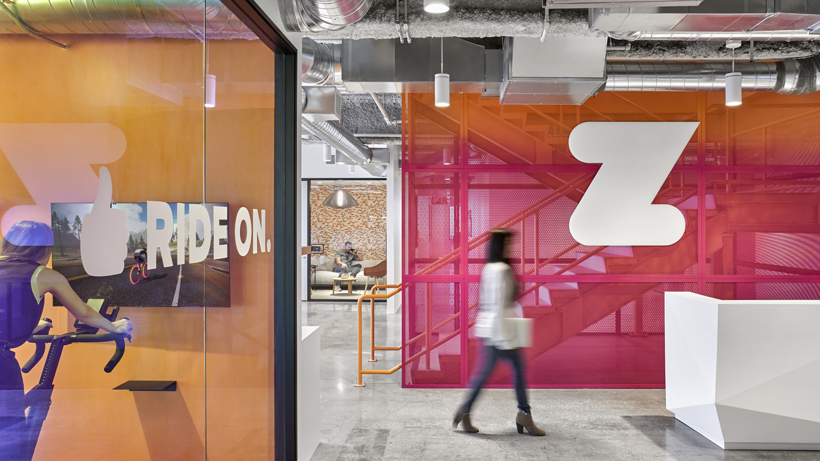 Zwift, Long Beach Zwift central stair, reception area, and stationary bike